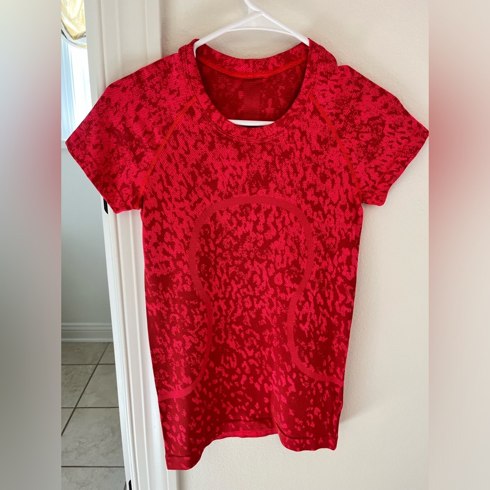 Lululemon swiftly t shirt, hip length, size 4.